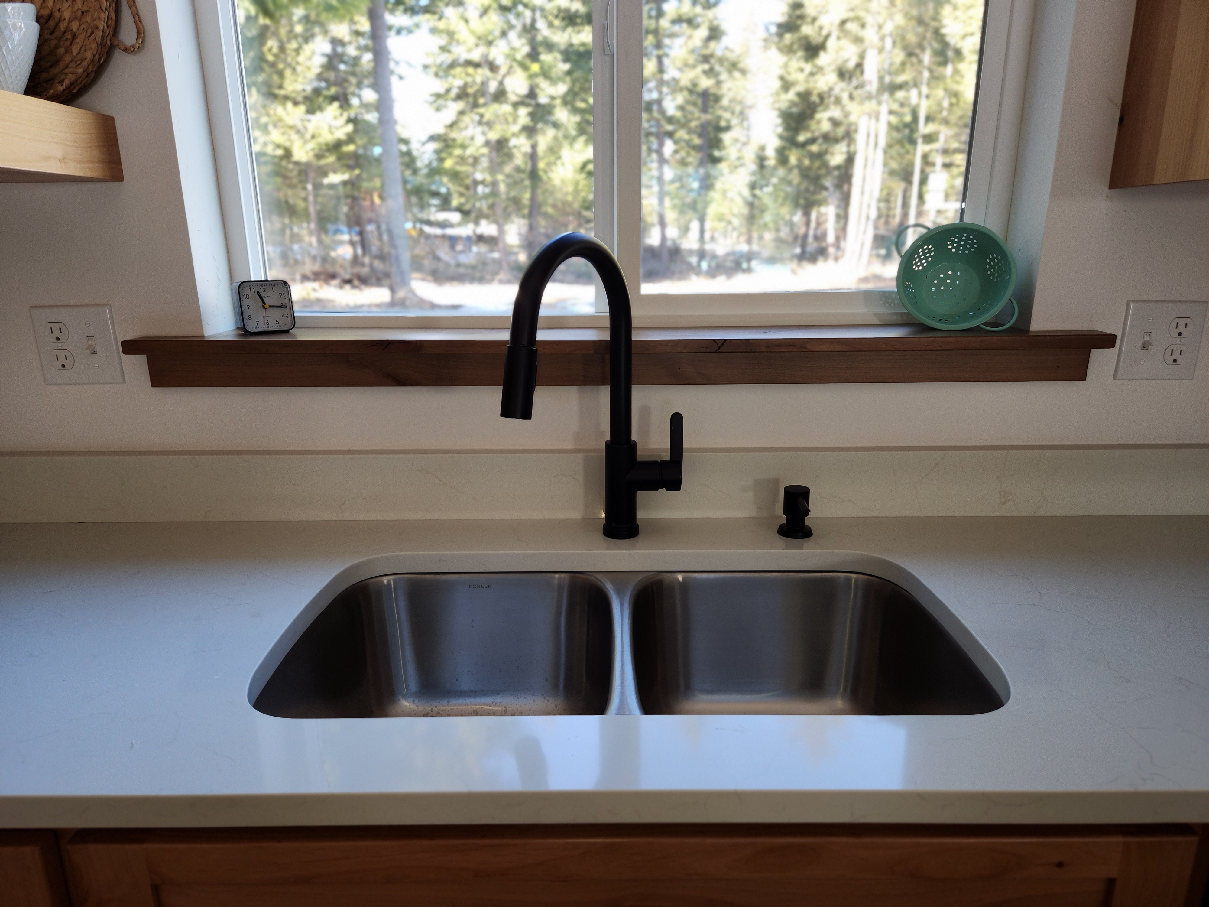Black pull-down kitchen faucet installed by Mountaintop Plumbing in Bonners Ferry